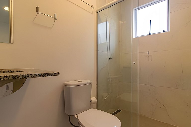 Casa Capri: 3 Suítes e Lazer ao Lado da Praia